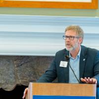 moderator of panel speaking